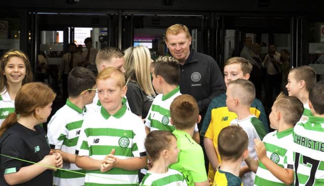 Neil Lennon with young fans at the Celtic Festival at the SEC. Picture: SNS