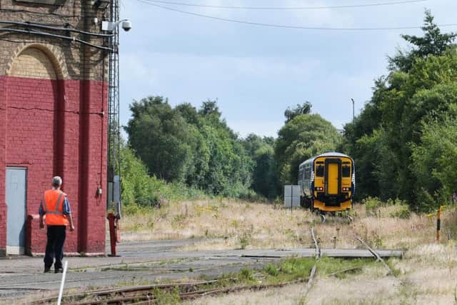 The last train to be refurbished leaving the site. Picture: John Devlin
