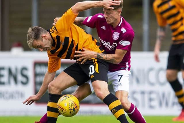 Alan Trouten scored twice for Alloa to help the Wasps to a 3-2 away victory at Arbroath