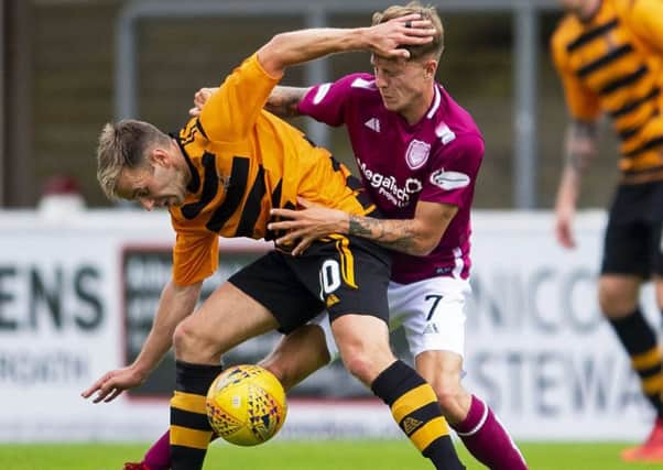 Alan Trouten scored twice for Alloa to help the Wasps to a 3-2 away victory at Arbroath
