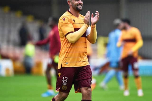 Motherwell's Peter Hartley celebrates at full-time.