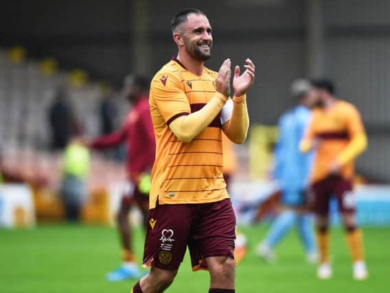 Motherwell's Peter Hartley celebrates at full-time.