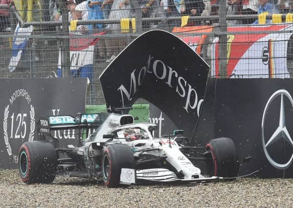 Lewis Hamilton manoeuvres his way back on to the track after crashing his car at the final corner of lap 29.  Picture: AFP/Getty.