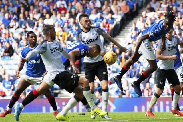 Nikola Katic stoops to head home the only goal of the game seven minutes from time. Picture: SNS.