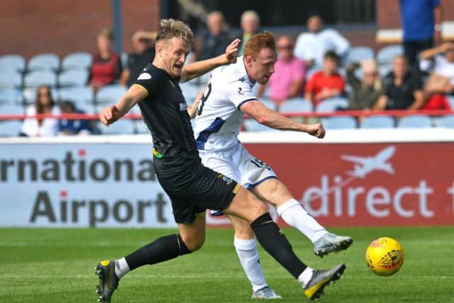 Danny Johnson fires a fizzing, left-foot shot beyond goalkeeper Mark Ridgers and into the net. Picture: SNS.