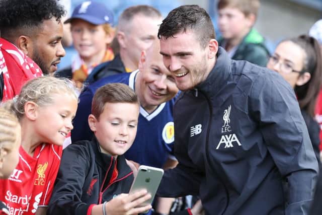 Andy Robertson poses for a selfie with fans at Murrayfield. Picture: Getty.