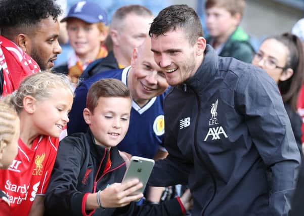 Andy Robertson poses for a selfie with fans at Murrayfield. Picture: Getty.