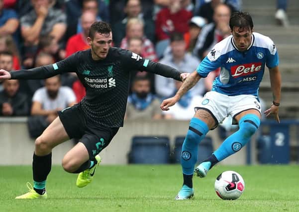 Andy Robertson challenges Napoli's Simone Verdi during Liverpool's 3-0 defeat at Murrayfield. Picture: PA.