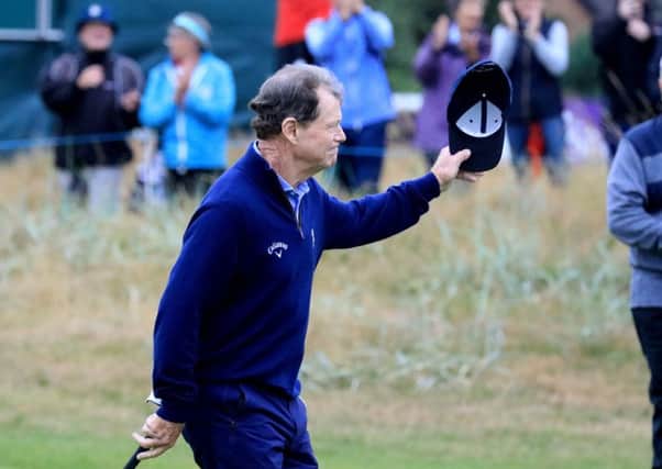 Tom Watson takes the acclaim of the galleries during his final   competitive round of links golf. Picture: Getty.
