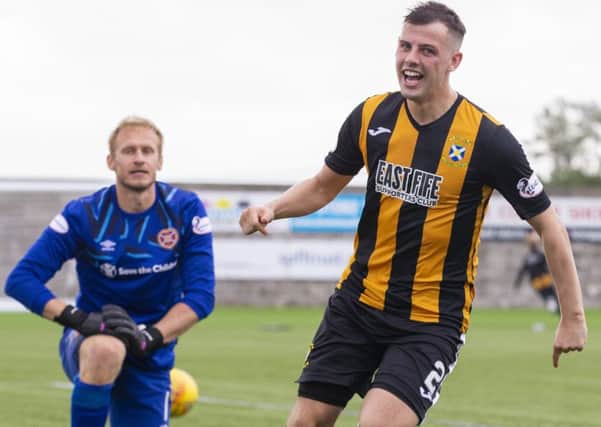 East Fife's Aaron Dunsmore laughs at Hearts goalkeeper Zdenek Zlamal after scoring the winning penalty in the shootout. Picture: Bruce White/SNS