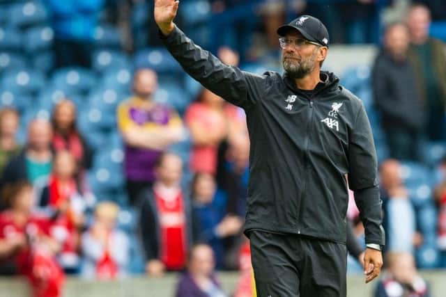Jurgen Klopp salutes the fans at BT Murrayfield