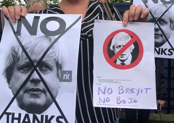 Protesters gathered outside Bute House as Boris Johnson met Nicola Sturgeon. Pictures: Lisa Ferguson