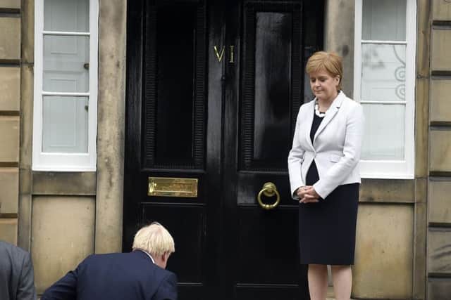Pic Lisa Ferguson 29/07/2019  Prime Minister Boris Johnson arrives this afternoon in Edinburgh to meet First Minisyer Nicola Sturgeon   He was greeted at Bute house with protestors