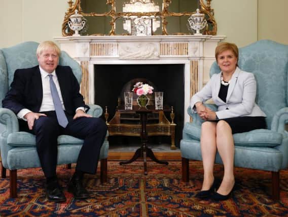 Boris Johnson and Nicola Sturgeon. Picture: PA