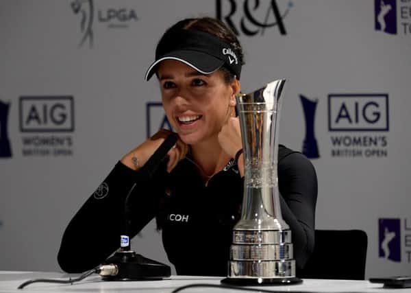 Georgia Hall with the real Women's British Open trophy as she talks to the press at Woburn. Picture: Ross Kinnaird/Getty