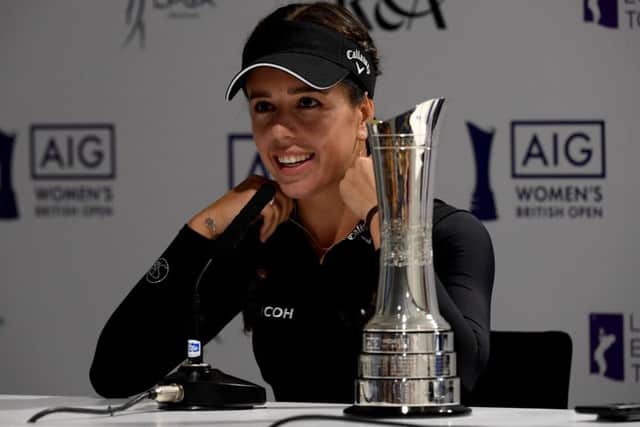 Georgia Hall with the real Women's British Open trophy as she talks to the press at Woburn. Picture: Ross Kinnaird/Getty