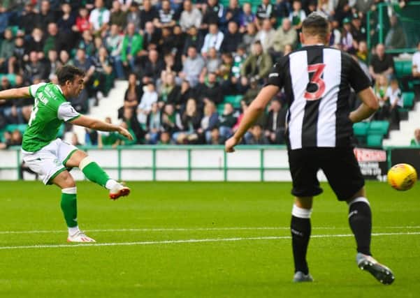 Stevie Mallan fires the ball home to give Hibs an early lead in their friendly against Newcastle. Picture: Craig Foy/SNS