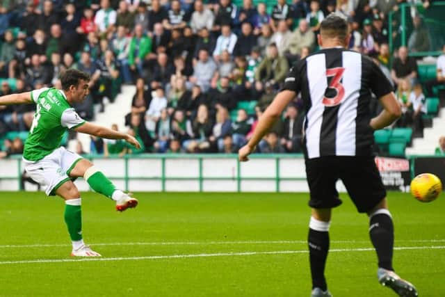 Stevie Mallan fires the ball home to give Hibs an early lead in their friendly against Newcastle. Picture: Craig Foy/SNS