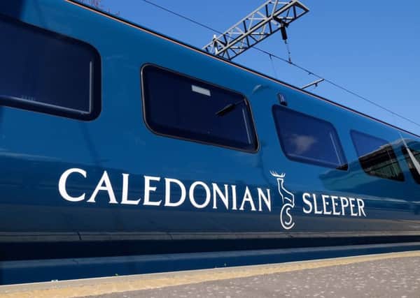 A Caledonian Sleeper train at Edinburgh Waverley Station.