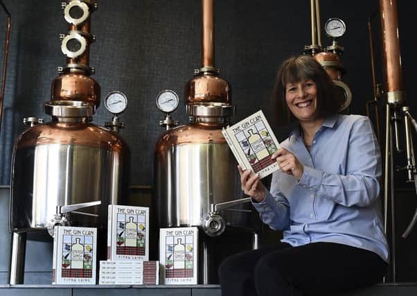 Fiona Laing with her book The Gin Clan. Picture: Lisa Ferguson