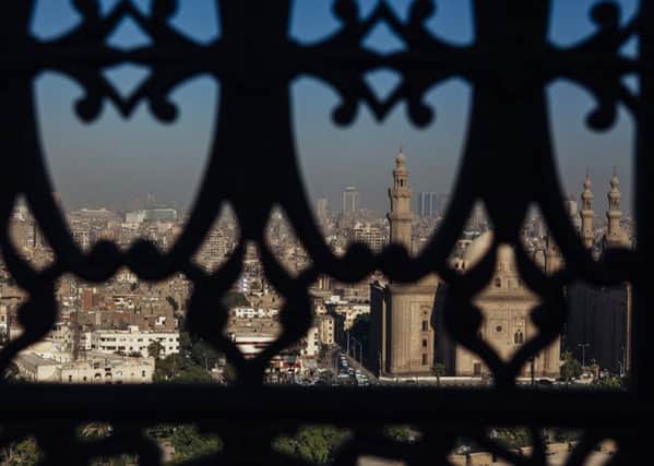 The skyline of Cairo as seen through a window of the Muhammad Ali Mosque in Cairo's Citadel PIC: Ed Giles/Getty Images