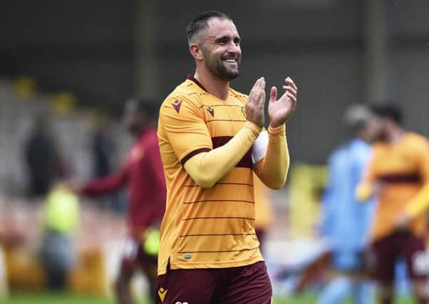 Peter Hartley applauds the Motherwell fans after their 4-0 Betfred Cup win over Annan Athletic. Picture: Rob Casey/SNS