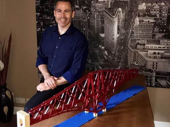 Michael Dineen with his 4.7-metre Lego model of the Forth Bridge