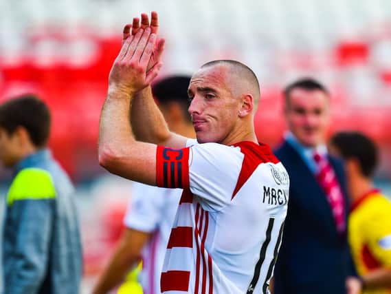 Darian MacKinnon will be at the heart of Hamilton's midfield once more. Picture: SNS