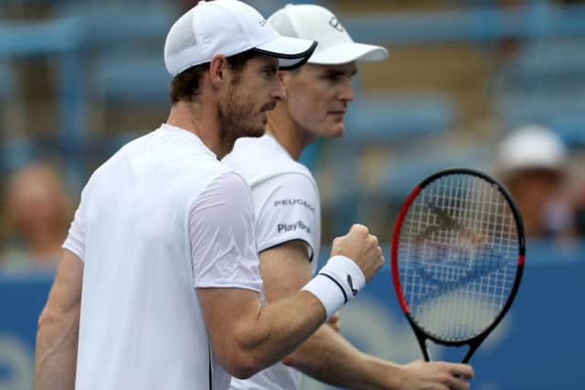 Andy Murray (left) and Jamie squeezed past Mahut and Roger-Vasselin