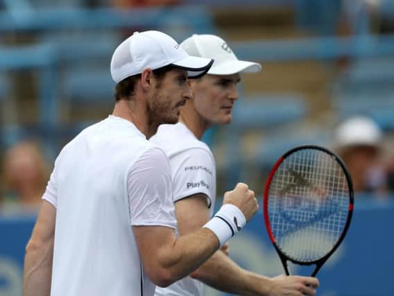 Andy Murray (left) and Jamie squeezed past Mahut and Roger-Vasselin