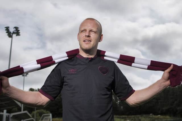 Steven Naismith has signed a four-year deal at Hearts.
