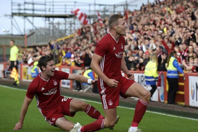 Aberdeen's Sam Cosgrove celebrates the first goal of his hat-trick. Picture: Ian Rutherford/PA Wire