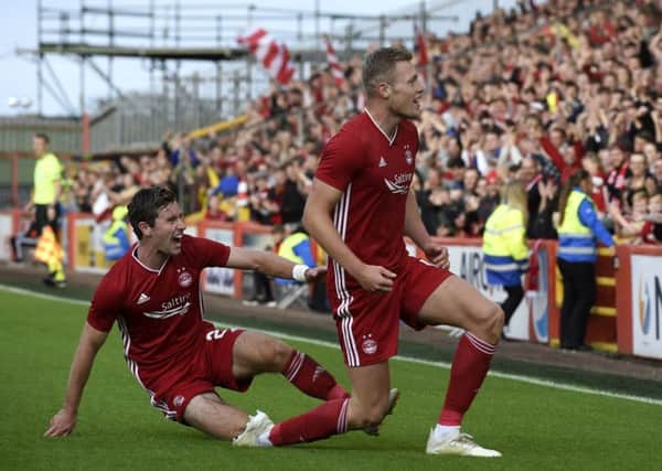 Aberdeen's Sam Cosgrove celebrates the first goal of his hat-trick. Picture: Ian Rutherford/PA Wire