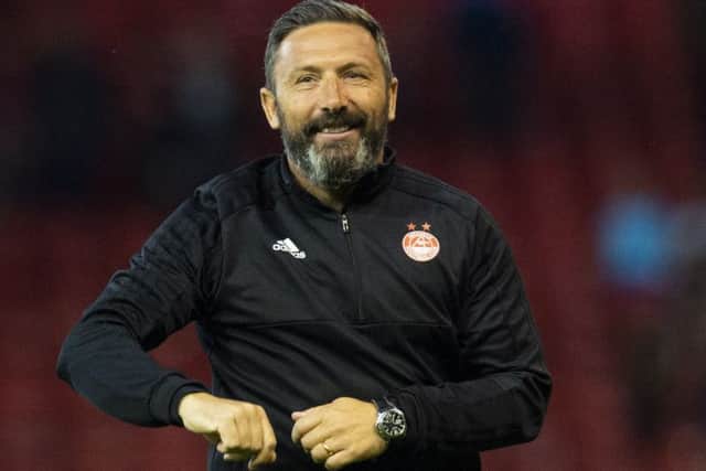 Aberdeen manager Derek McInnes celebrates at full time. Picture: SNS