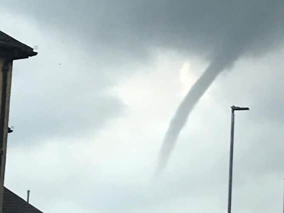 The funnel cloud over Johnston, Renfrewshire. Picture: Dave Morrison, Twitter