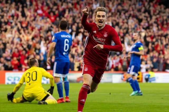 Scott Wright celebrates after scoring Aberdeen's fourth.