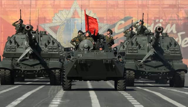 Russian Msta S artillery vehicles roll across Dvortsovaya Square during a rehearsal for the Victory Day military parade in Saint Petersburg in April. (Photo: OLGA MALTSEVA/AFP/Getty Images)
