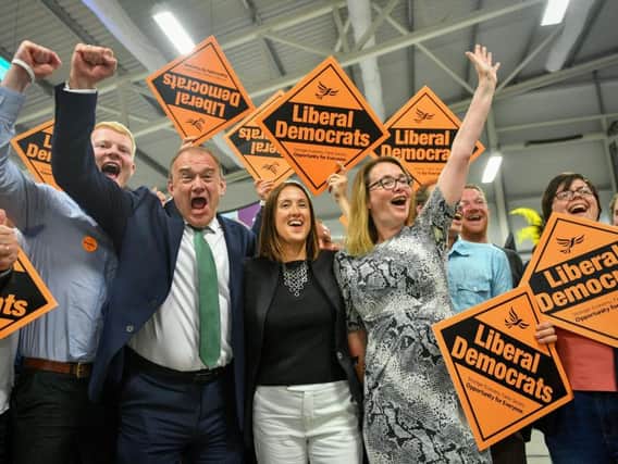 Lib Dems celebrating after their win. Picture: PA