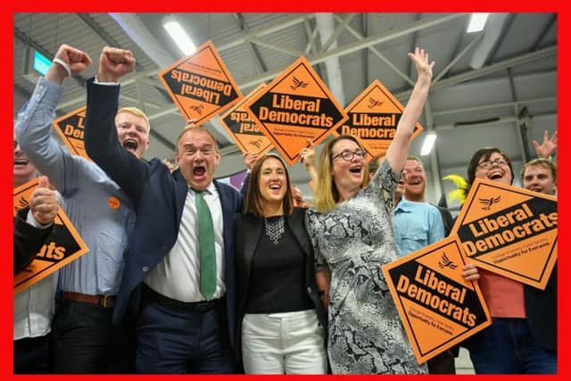 Liberal Democrat MP Jane Dodds, centre, celebrates with supporters as she wins the seat in the Brecon and Radnorshire by-election at the Royal Welsh Showground, Llanelwedd, Builth Wells. PRESS ASSOCIATION