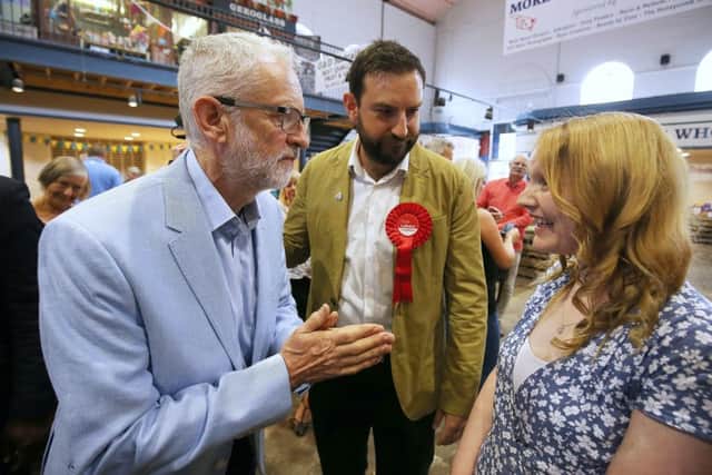 Labour leader Jeremy Corbyn speaks to people during a visit to Scarborough Public Market to discuss the impact of a no-deal Brexit on food bills. PRESS ASSOCIATION