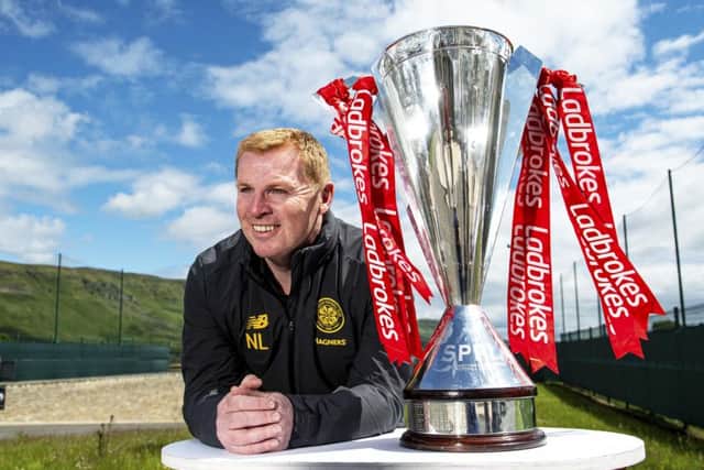 Neil Lennon with the Ladbrokes Premiership trophy Celtic won for the eighth time in a row last season.