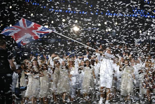 Britain's flagbearer Chris Hoy at the opening ceremony of the London 2012 Olympic Games. Picture: Matt Dunham/AFP/Getty Images