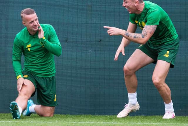 Scott Brown jokes with Leigh Griffiths during training