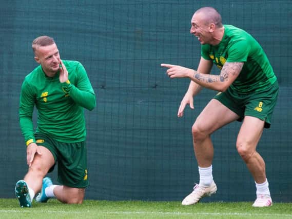 Scott Brown jokes with Leigh Griffiths during training