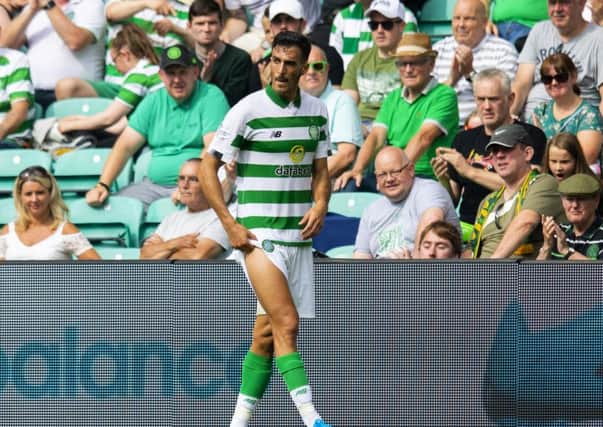 Celtic's Hatem Abd Elhamed walks off with an injury. Pic: SNS