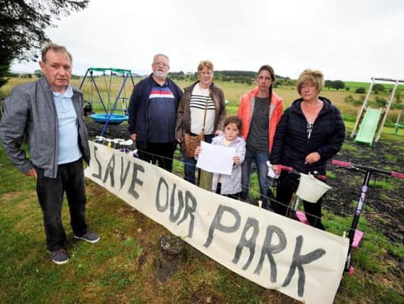 Parents and grandparents living in Cronberry, East Ayrshire, cobbled together 1,000 to pay for trampolines, swings and a slide on agricultural land donated by a farmer.
