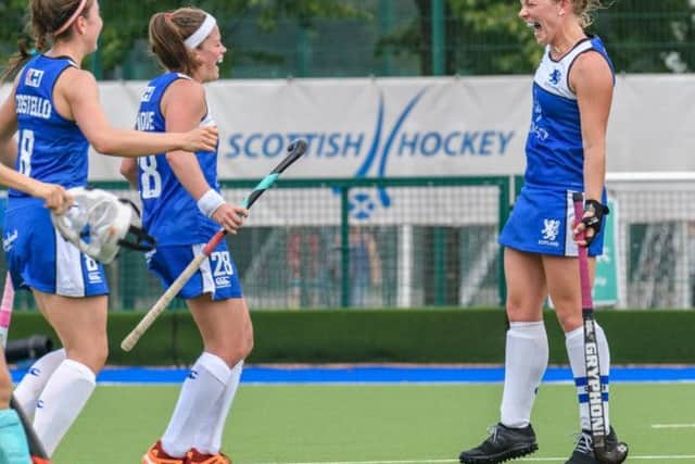 Kaz Cuthbert, who struck twice for Scotland, shows her delight as her team eased their way to a 7-0 victory in the opening pool match against Ukraine. Picture: Duncan Gray