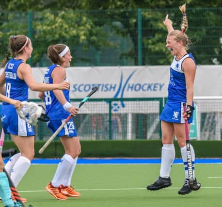 Kaz Cuthbert, who struck twice for Scotland, shows her delight as her team eased their way to a 7-0 victory in the opening pool match against Ukraine. Picture: Duncan Gray