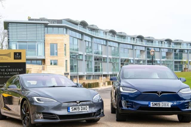 Motorists have been snapping up pure electric cars such as these Teslas. Picture: Ian Georgeson