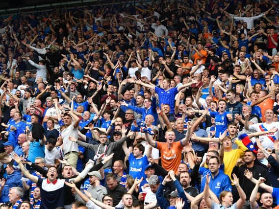 Rangers fans in the away stand at Rugby Park.
